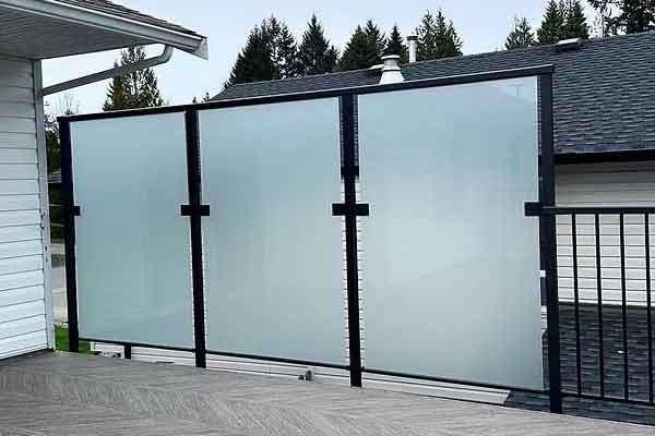 Glass privacy railings in Ontario are also idea for wind protection.