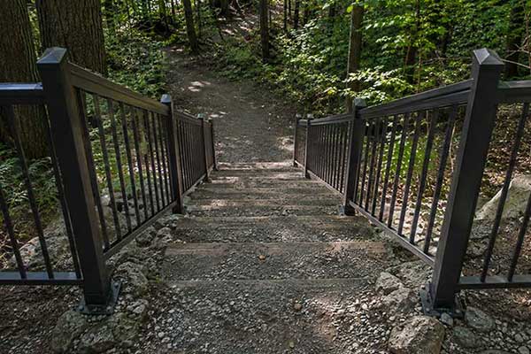 Black custom aluminum railing installation for Chatham Kent nature trail.